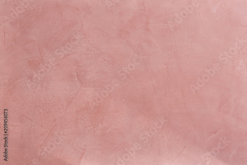 Natural bordoux plaster background with abstract pattern, close-up, macro.