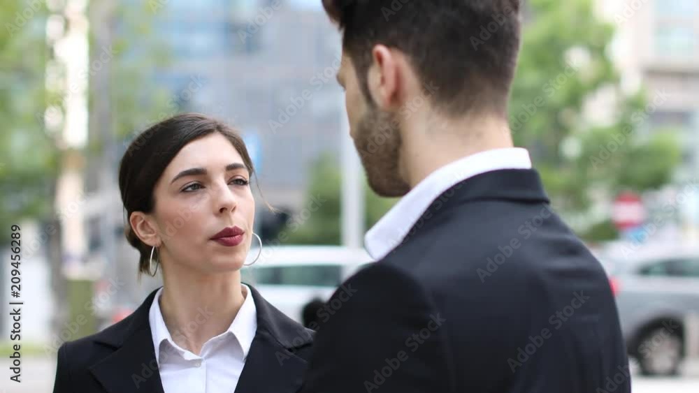 Business partners discussing together Business partners discussing together