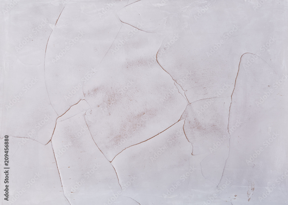 Obraz premium White plastered wall background with abstract pattern, close-up, macro.