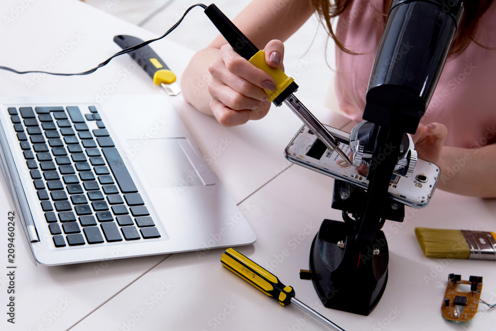 Mobile phone repair in workshop