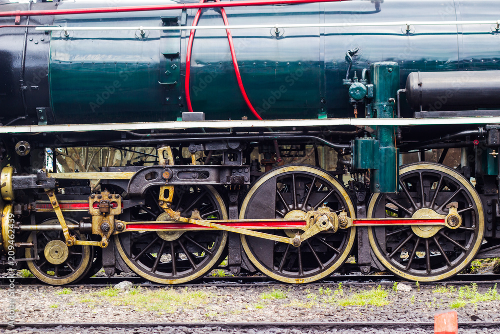 The train wheel. of Steam locomotive - Thonburi Railway Station - Thailand The train wheel. of Steam locomotive - Thonburi Railway Station - Thailand