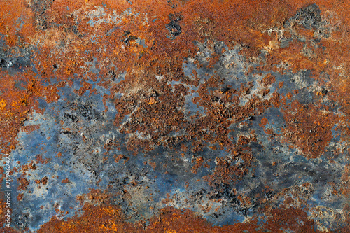 A rusty steel plate as background.