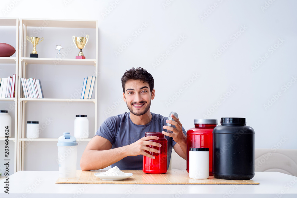 Athlete tasting new protein supplements for better muscles Athlete tasting new protein supplements for better muscles