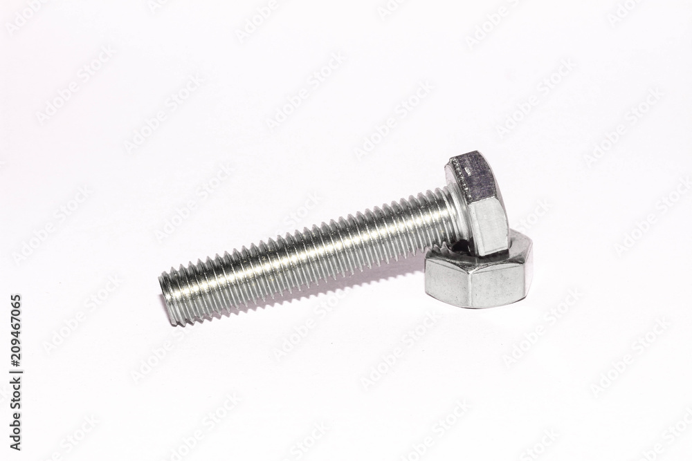 Metal bolt and nut isolated on white background Metal bolt and nut isolated on white background
