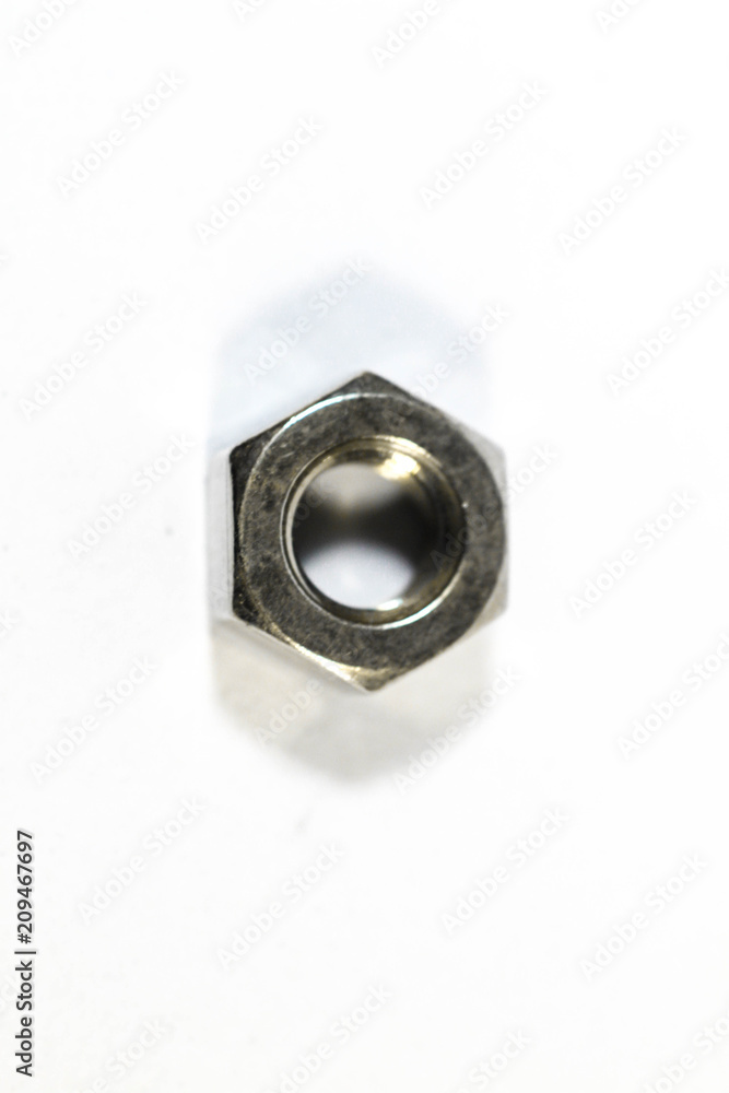 Metal bolt and nut isolated on white background Metal bolt and nut isolated on white background