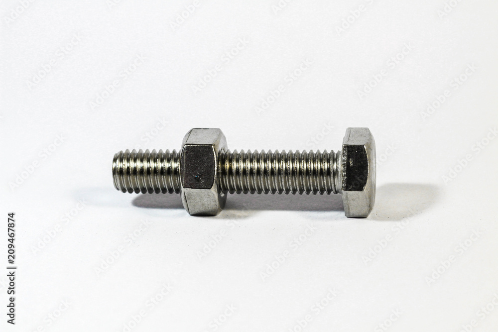 Metal bolt and nut isolated on white background Metal bolt and nut isolated on white background