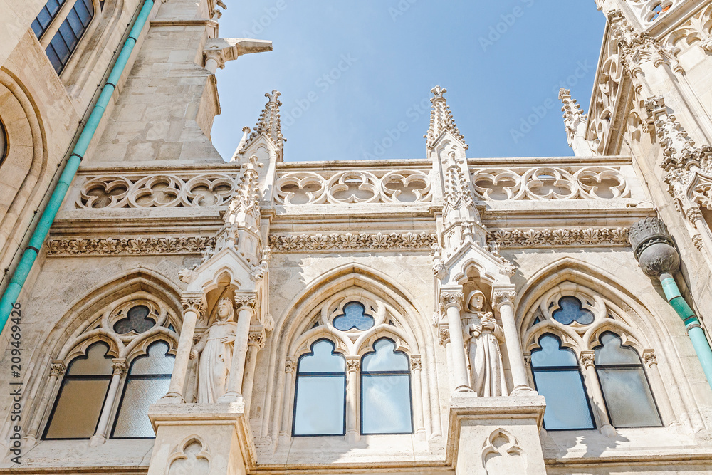 The white gothic exterior of St Matthias Cathedral in Budapest