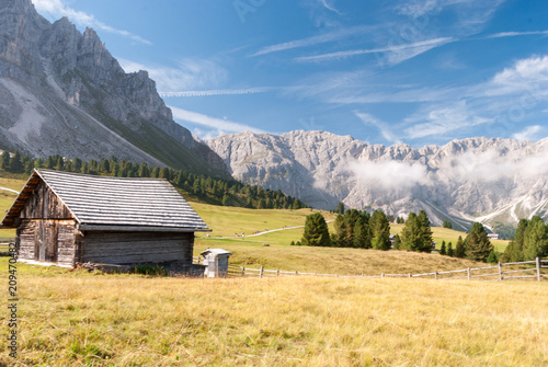 St. Magdalena, Italy - August 27, 2015: mountain hut to the base of the Dolomites