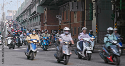 Motorway with busy Motorbike traffic in taipei city © leungchopan