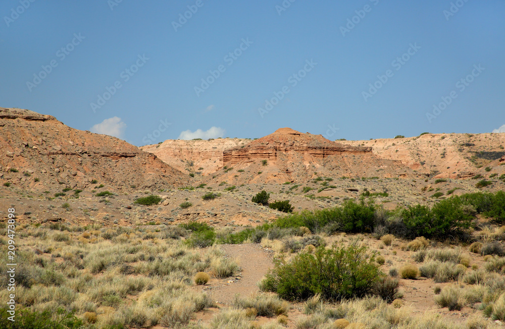 Fototapeta premium Stone path into a sandstone mountain landscape