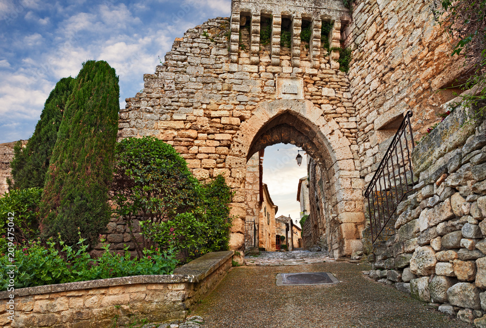 Lacoste, Vaucluse, Provence, France: The Portal de la Garde at the entrance to the old town