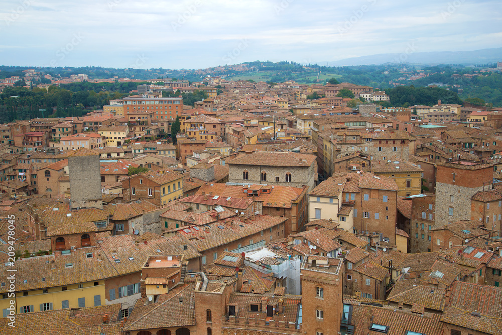 The old district of Siena on a cloudy September day. Italy
