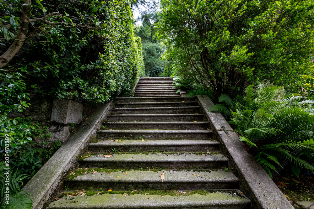 Old shady stone staircase at Isola Bella island