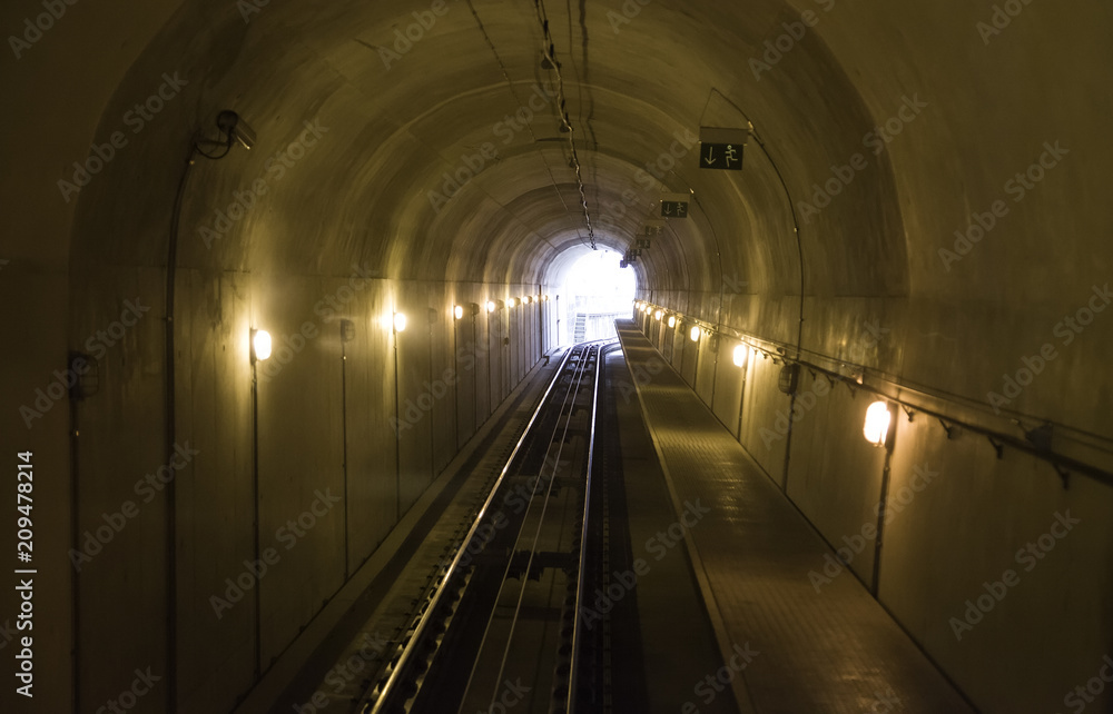 Train tracks in a tunnel