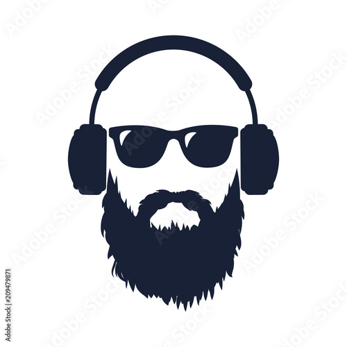 Bearded man in sunglasses and headphones