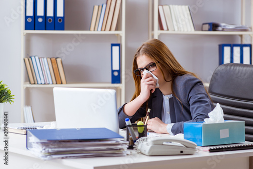 Businesswoman employee sick in the office