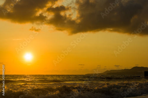 Amazing sea sunset  the sun  waves  clouds