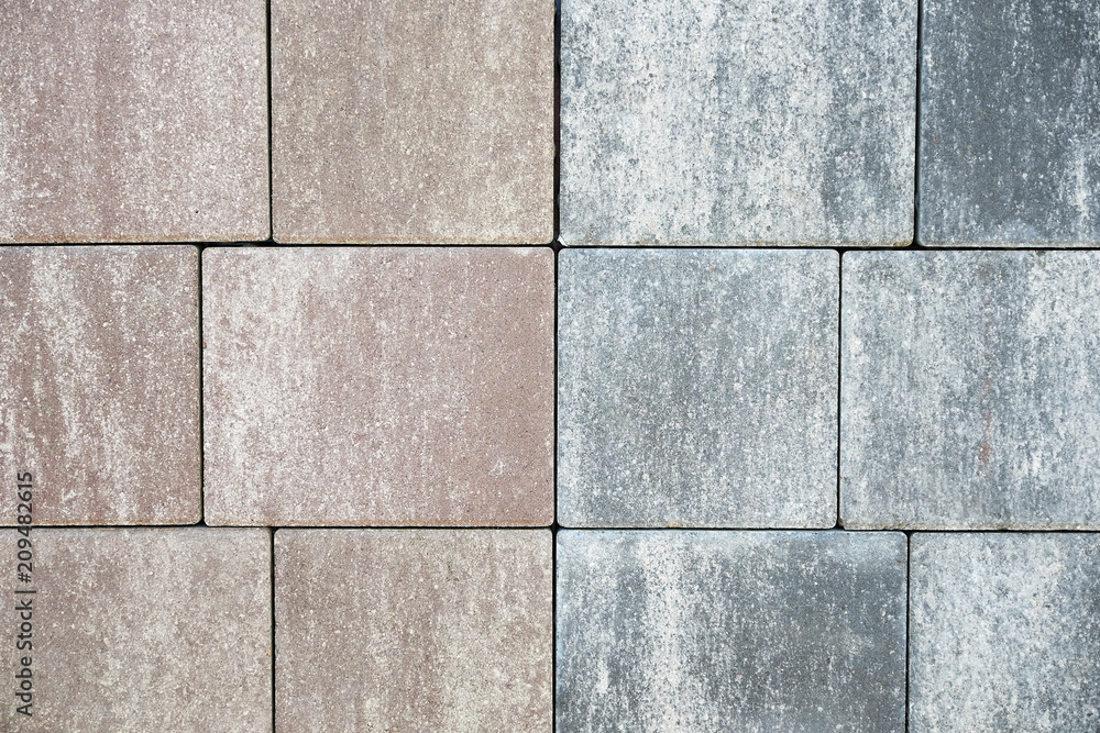 Fototapeta premium Brick wall with variegated brown bricks. Used as a background.
