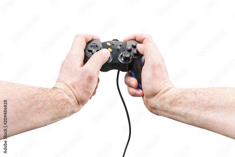 Fototapeta premium Man hands hold the joystick by pressing the control buttons, isolated on a white background, first person view