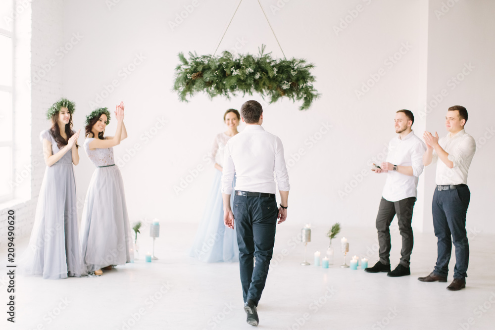 Master of ceremony speech and bridesmaids and groommen are waiting for the groom before wedding ceremony. Groom is going to the ceremony master. Master of ceremony speech and bridesmaids and groommen are waiting for the groom before wedding ceremony. Groom is going to the ceremony master.