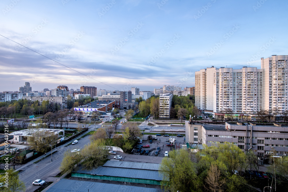 Obraz premium View from above on residential blocks and streets of Moscow