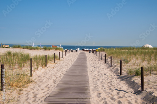 Boardwalk leading to beautiful white sand beach