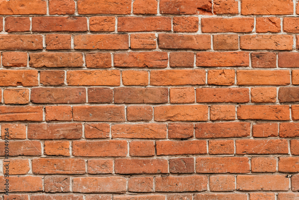 Texture of a old red brick wall background
