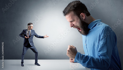 Giant hipster man yelling at a small karate man