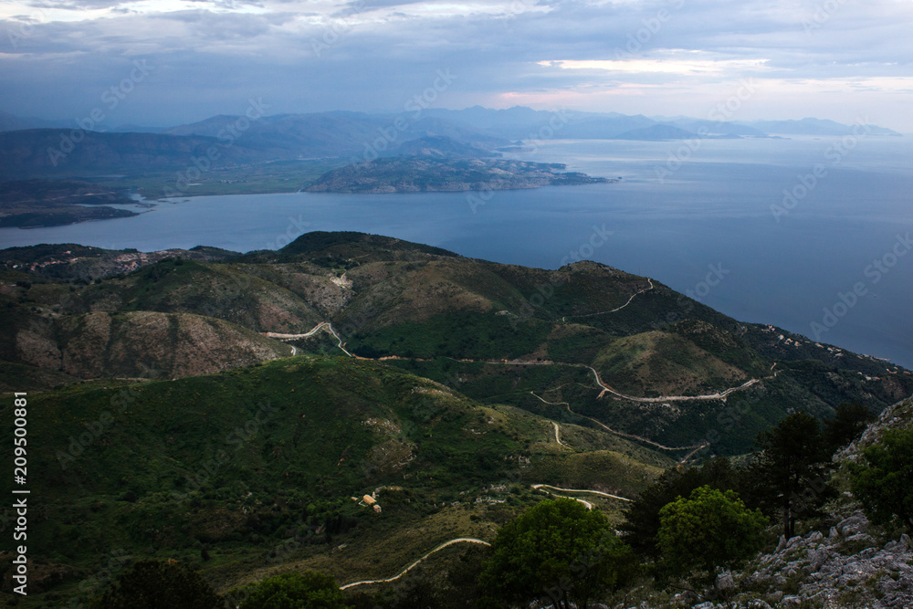 Breathtaking scenic view of mountainous land located in some rural area near the ocean. Perfect scenery as subject for photography and sight seeing for tourist. Breathtaking scenic view of mountainous land located in some rural area near the ocean. Perfect scenery as subject for photography and sight seeing for tourist.
