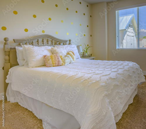 Large clean bed in bedroom