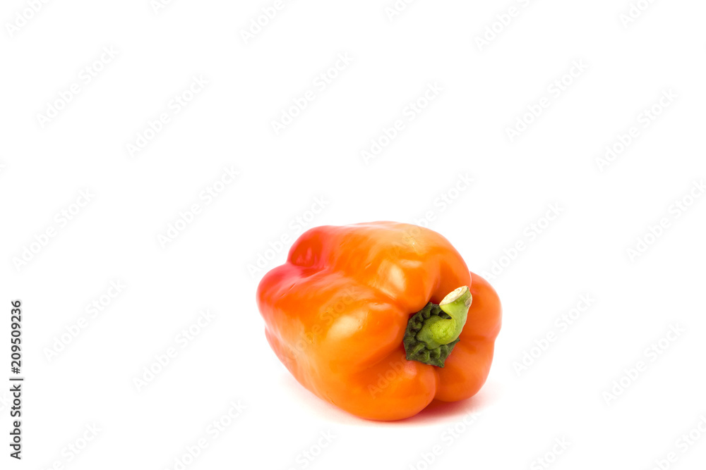 Orange bell pepper on white background