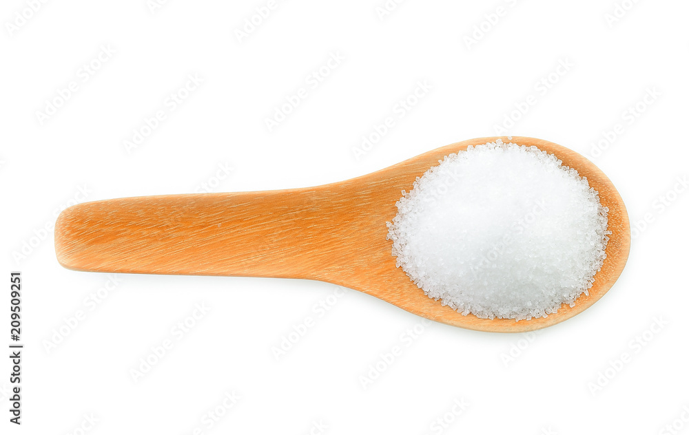 sugar in wood spoon on white background sugar in wood spoon on white background