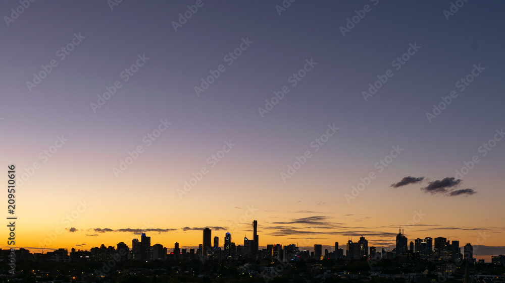 Dark Melbourne skyline with dusk negative space Dark Melbourne skyline with dusk negative space