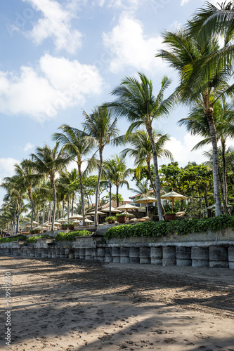 Beach hotel with palm trees in Seminyak, Bali © Melinda