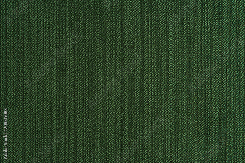 Green fabric texture background.
