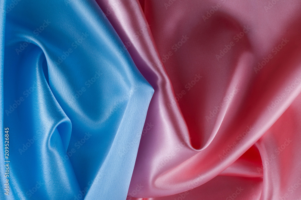 Abstract silk luxury background, piece of cloth, light pink and light blue cloth texture. Abstract silk luxury background, piece of cloth, light pink and light blue cloth texture.
