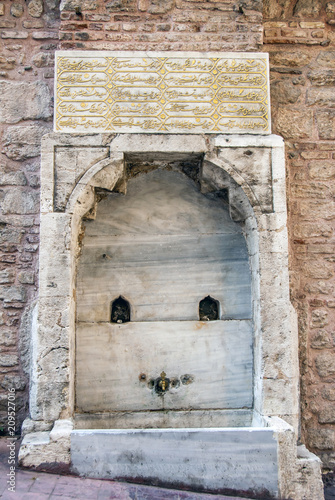 Istanbul, Turkey, 8 June 2018: Matbah Emini Hasan Aga Fountain at Pera Yuksek Kaldirim, Karakoy Beyoglu district of Istanbul. photo