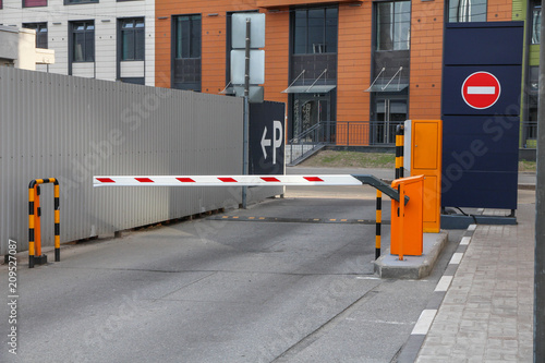 automatic barrier at the entrance to parking in the urban environment