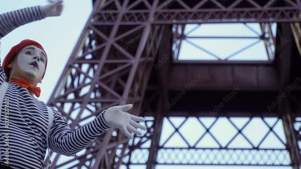 Funny mime touching invisible glass Funny mime touching invisible glass