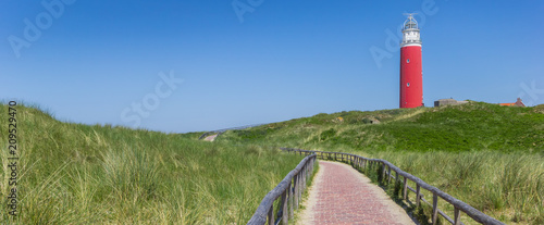 Foto Panorama of the path leading to the lighthouse on Texel island, The Netherlands