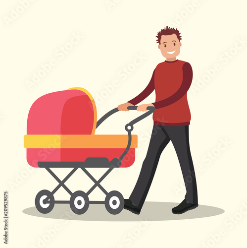 Young dad walking with a newborn that is in the stroller.