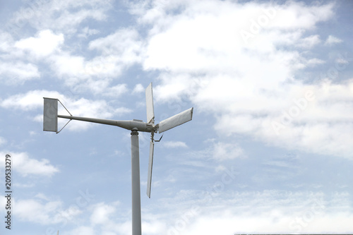 A wind turbine is a device that converts the wind's kinetic energy into electrical energy.  © saobaka