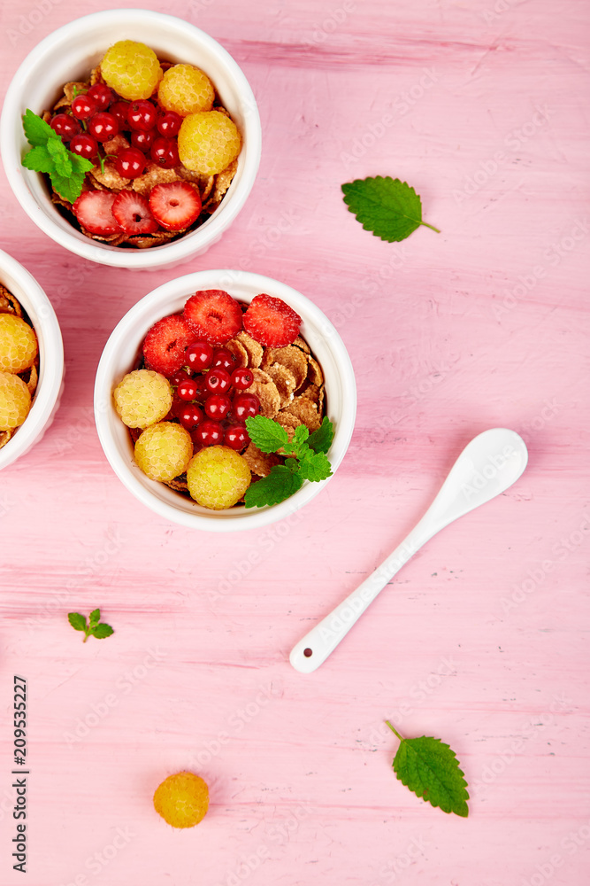 ..Healthy breakfast on white bowls.