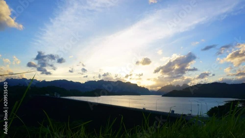 Sky clouds sea mountains forest at the dam by timelapse