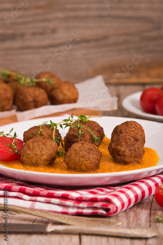 Meatballs with carrot purée.