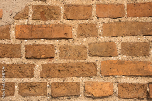 Wall of red brick. Texture / background.