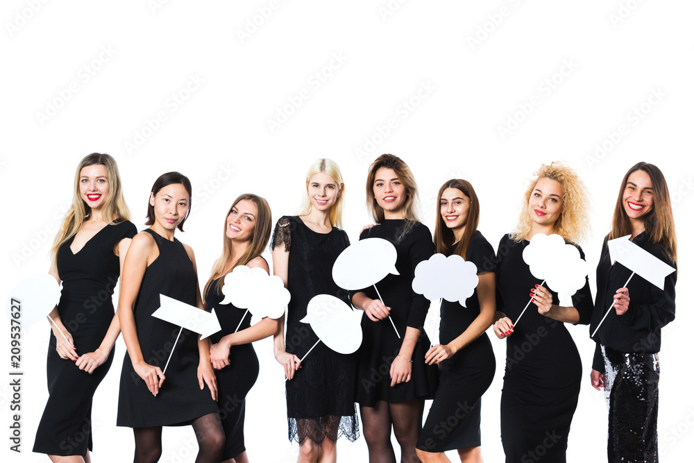 Group of young beautiful women in black dress isolated on white background.