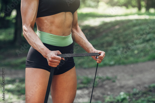 Fitness Woman Doing Training Workout Outdoor in Summer Morning Park. Concept Sport Healthy Lifestyle.