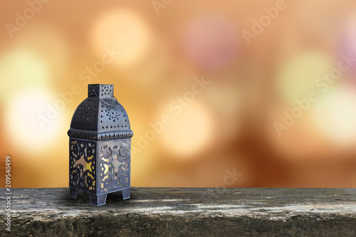 Ramadan Kareem background with Eid lamp or Arabic lantern on gold candle light bokeh for Islamic muslims religious fasting month photo