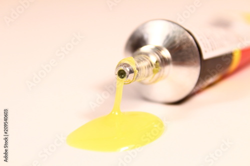 Highly resistant waterproof glue. Universal adhesive in a metal tube. Close-up. Background.